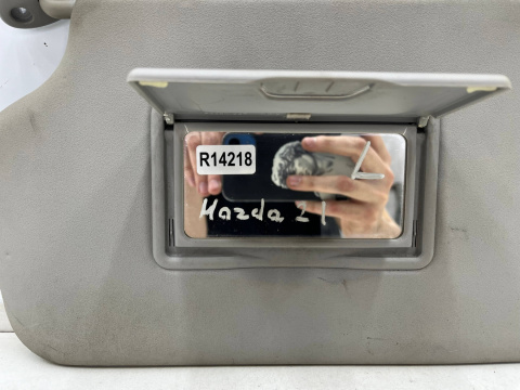 Daszek Mazda 2 I DY 02-07r. lewy przeciwsłonecznik pasażera OSŁONA SŁONECZNA
