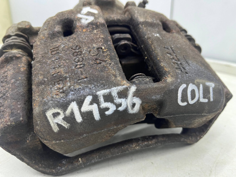 Zacisk hamulcowy Mitsubishi Colt VI 6 Z30 Smart Forfour I w454 04-12r. LEWE przednie jarzmo mocowanie lewy przód