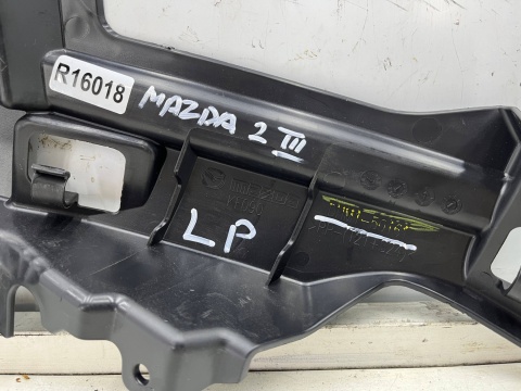 Ślizg Mazda 2 III DJ DL 2019r.- lewe przednie mocowanie zderzaka wspornik uchwyt lewy przód NOWY dhm1-50161