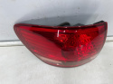 Lampa Toyota Avensis Verso Ipsum 01-03r. LEWA tylna w błotnik oryginalna lewy tył Koito 44-35