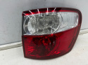 Lampa Toyota Avensis Verso Ipsum LIFT 03-09r. prawa tylna w błotnik oryginalna prawy tył Koito 44-57