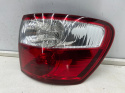 Lampa Toyota Avensis Verso Ipsum LIFT 03-09r. prawa tylna w błotnik oryginalna prawy tył Koito 44-57