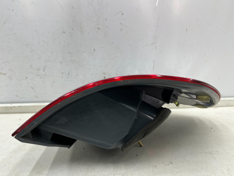 Lampa Toyota Avensis Verso Ipsum LIFT 03-09r. prawa tylna w błotnik oryginalna prawy tył Koito 44-57