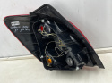 Lampa Toyota Corolla Verso I E12 01-04r. prawa tylna w błotnik oryginalna prawy tył