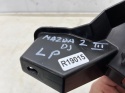 Ślizg Mazda 2 III DJ lift 23r.- lewe przednie dolne mocowanie wspornik uchwyt osłona kratki atrapy zderzaka d65e-50161