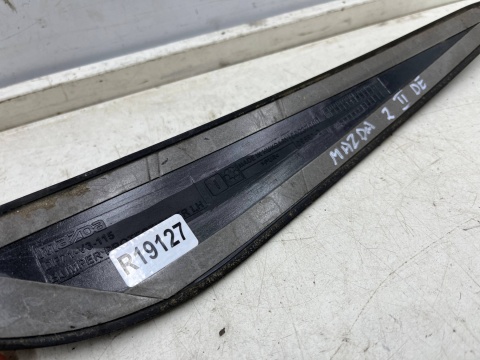 Listwa zderzaka Mazda 2 II DE DH 07-12r. LEWA nakładka dodatkowa ochronna na przedni zderzak oryginalna
