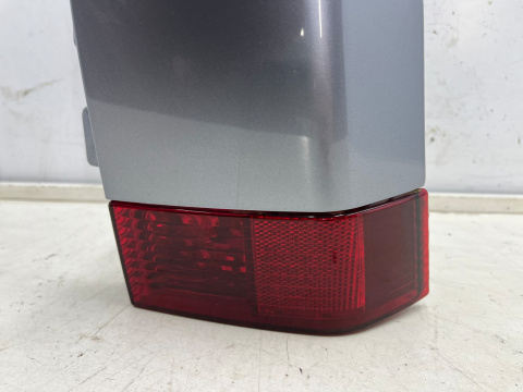 Lampa Opel Meriva A LIFT 05-10r. PRAWA tylna czarna w błotnik z narożnikiem z163 oryginalna prawy tył 13196001