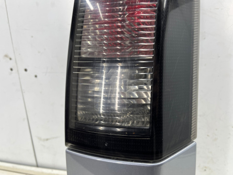 Lampa Opel Meriva A LIFT 05-10r. PRAWA tylna czarna w błotnik z narożnikiem z163 oryginalna prawy tył 13196001