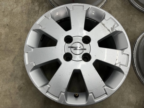 Felga Opel Meriva A Corsa C Tigra B 99-08r. 6jx15 ET43 4x100 felgi aluminiowe 15 cali oryginalne Ronal KOMPLET 13211455