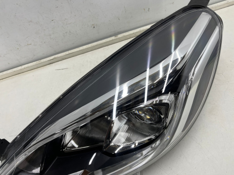 Lampa reflektor Ford Fiesta VII MK8 16-21r. LEWA przednia soczewka z LED + H1 lewy przód Europa oryginalna l1bb-13e015-ce