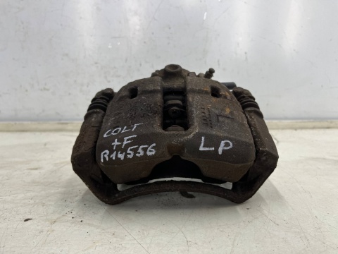 Zacisk hamulcowy Mitsubishi Colt VI 6 Z30 Smart Forfour I w454 04-12r. LEWE przednie jarzmo mocowanie lewy przód