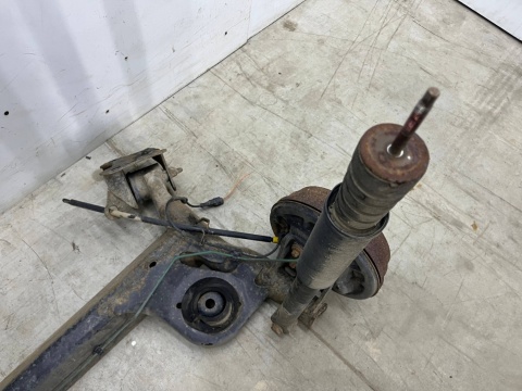 Belka zawieszenia Dacia Logan 1 I MCV kombi VAN 05-14r. DOSTAWCZAK tylna oś wózek amortyzatory ABS