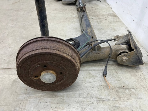 Belka zawieszenia Dacia Logan 1 I MCV kombi VAN 05-14r. DOSTAWCZAK tylna oś wózek amortyzatory ABS