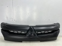 Atrapa Mitsubishi L200 5 V 19r.- grill przednia maskownica zderzaka znaczek 7450B264