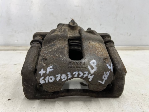 Zacisk hamulcowy Dacia Logan 1 I 04-12r lewe przednie jarzmo mocowanie