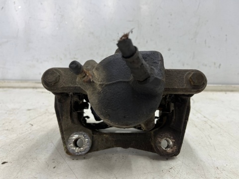 Zacisk hamulcowy Dacia Logan 1 I 04-12r lewe przednie jarzmo mocowanie