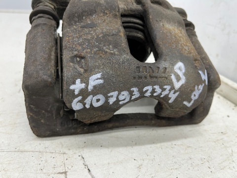 Zacisk hamulcowy Dacia Logan 1 I 04-12r lewe przednie jarzmo mocowanie