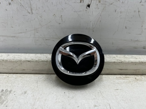 Kołpak Mazda dekielek zaślepka felgi aluminiowej 57 mm. oryginalny bbm237190