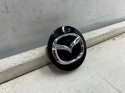 Kołpak Mazda dekielek zaślepka felgi aluminiowej 57 mm. oryginalny bbm237190