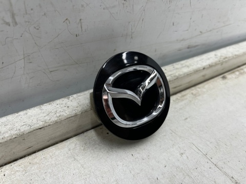 Kołpak Mazda dekielek zaślepka felgi aluminiowej 57 mm. oryginalny bbm237190