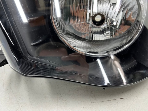 Lampa reflektor Mitsubishi L200 KA KB 05-10r. LEWA przednia H4 oryginalna lewy przód EU 8301b461