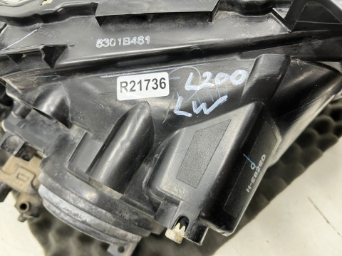 Lampa reflektor Mitsubishi L200 KA KB 05-10r. LEWA przednia H4 oryginalna lewy przód EU 8301b461