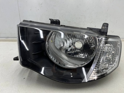 Lampa reflektor Mitsubishi L200 KA KB 05-10r. LEWA przednia H4 oryginalna lewy przód EU 8301b461
