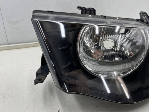 Lampa reflektor Mitsubishi L200 KA KB 05-10r. LEWA przednia H4 oryginalna lewy przód EU 8301b461