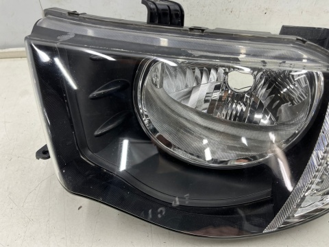 Lampa reflektor Mitsubishi L200 KA KB 05-10r. LEWA przednia H4 oryginalna lewy przód EU 8301b461