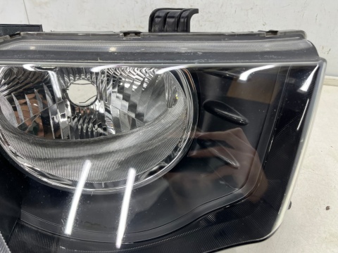 Lampa reflektor Mitsubishi L200 KA KB 05-10r. PRAWA przednia H4 oryginalna prawy przód EU 8301b462