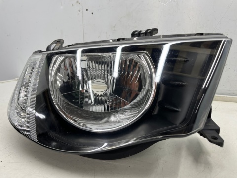 Lampa reflektor Mitsubishi L200 KA KB 05-10r. PRAWA przednia H4 oryginalna prawy przód EU 8301b462