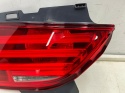 Lampa BMW F07 GT Gran Turismo 09-13r. lewa tylna w klapę bagażnika LED oryginalna EU 7199637