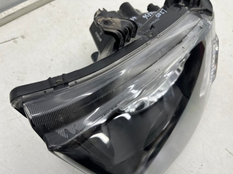 Lampa reflektor Mitsubishi L200 KA KB 05-10r. LEWA przednia H4 oryginalna lewy przód EU 8301b461