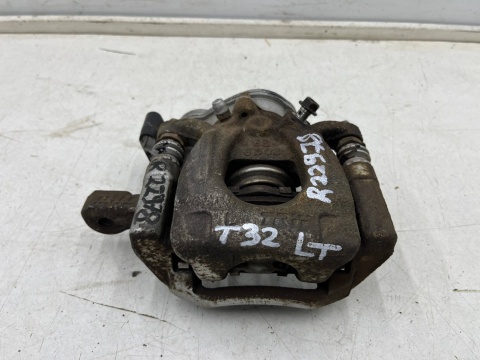 Zacisk hamulcowy Nissan X-Trail III T32 Rogue 13-21r. lewy tylny jarzmo lewy tył elektryczny ręczny