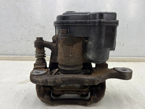 Zacisk hamulcowy Nissan X-Trail III T32 Rogue 13-21r. lewy tylny jarzmo lewy tył elektryczny ręczny