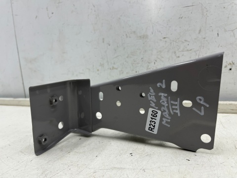 Mocowanie błotnika Mazda 2 III DJ DL 14-19r. NOWE lewe przednie wspornik podpora lewy przód