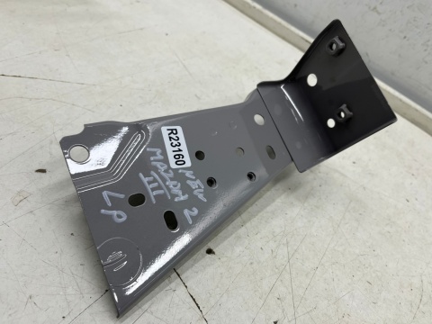 Mocowanie błotnika Mazda 2 III DJ DL 14-19r. NOWE lewe przednie wspornik podpora lewy przód