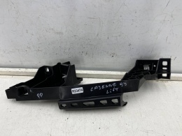 Ślizg Porsche Cayenne III 9y LIFT 23r.- prawe przednie mocowanie reflektora okular wspornik pasa pod lampę prawy przód