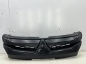 Atrapa Mitsubishi L200 5 V 19r.- grill przednia maskownica zderzaka znaczek 7450B264