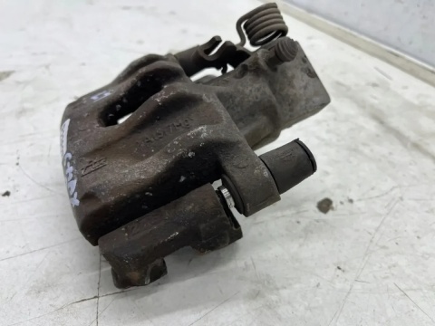 Zacisk hamulcowy Ford C-max MK2 Focus MK3 Kuga Volvo 12r.- LEWY tylny