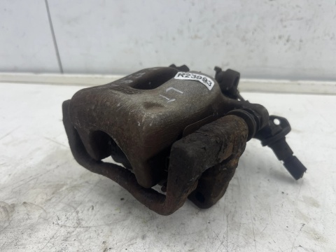 Zacisk hamulcowy Opel Zafira B 05-14r. lewy tył