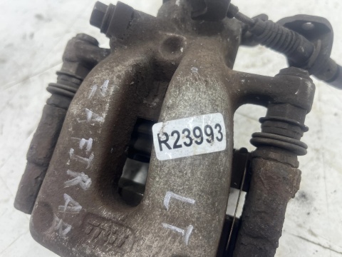 Zacisk hamulcowy Opel Zafira B 05-14r. lewy tył