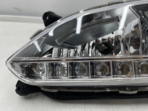 Lampa reflektor Hyundai Santa Fe 3 III 12-15r. lewy przedni halogen LED w zderzak oryginalny DRL 922012w110