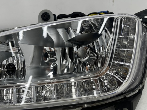 Lampa reflektor Hyundai Santa Fe 3 III 12-15r. lewy przedni halogen LED w zderzak oryginalny DRL 922012w110
