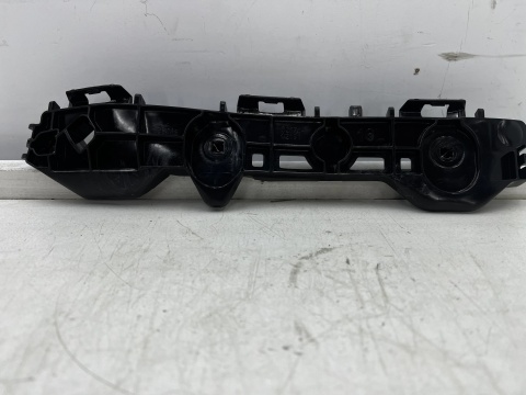 Ślizg Toyota Corrola E210 18r.- HB NOWE lewe tylne mocowanie zderzaka wspornik 52576-02191