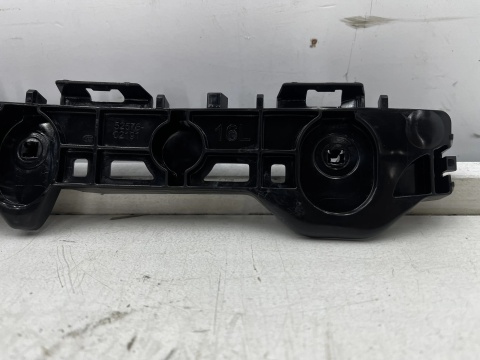 Ślizg Toyota Corrola E210 18r.- HB NOWE lewe tylne mocowanie zderzaka wspornik 52576-02191