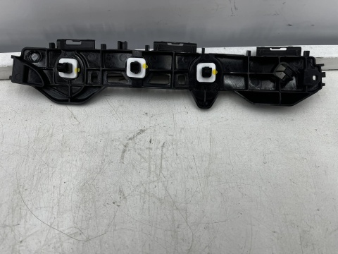 Ślizg Toyota Corrola E210 18r.- HB NOWE lewe tylne mocowanie zderzaka wspornik 52576-02191