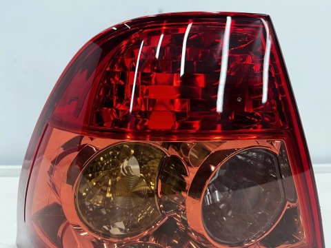 Lampa Toyota Corolla IX E12 SEDAN 04-07r. Lift NOWA lewa tylna EU Oryginalna w błotnik lewy tył 81561-02260