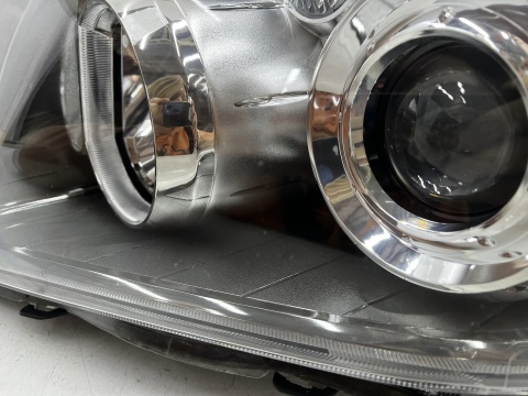 Lampa reflektor Toyota Avensis 2 II T25 LIFT 06-09r. lewa przednia EU H7 soczewka lewy przód 81170-05240
