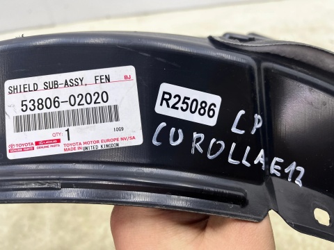 Nadkole Toyota Corolla E12 01-07r. lewe przednie ORYGINALNE lewy przód 53876-02081